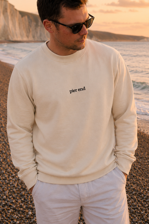 Natural raw organic cotton t-shirt worn at the Sussex coast at sunset