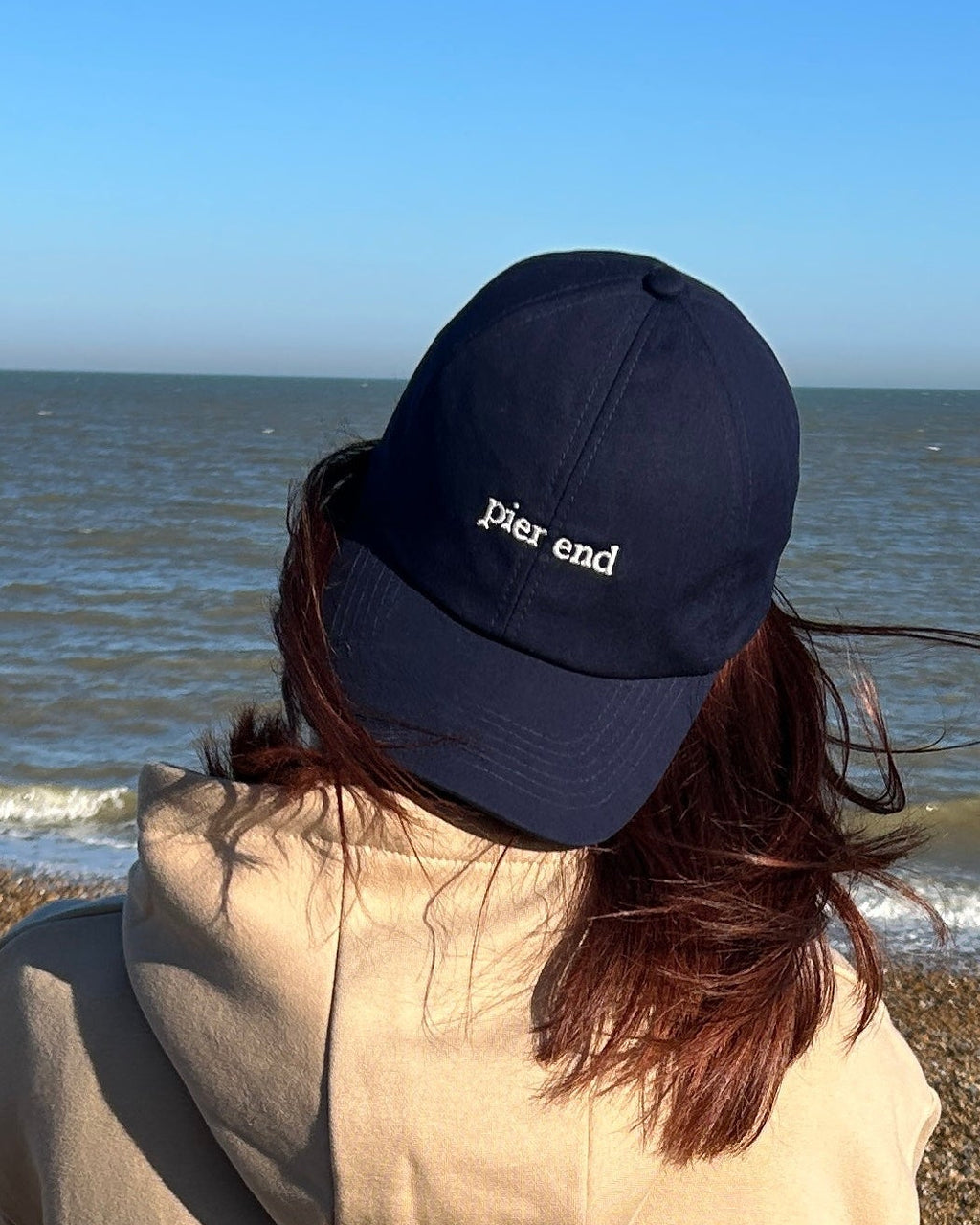 Oyster Pier End cap worn on the beach